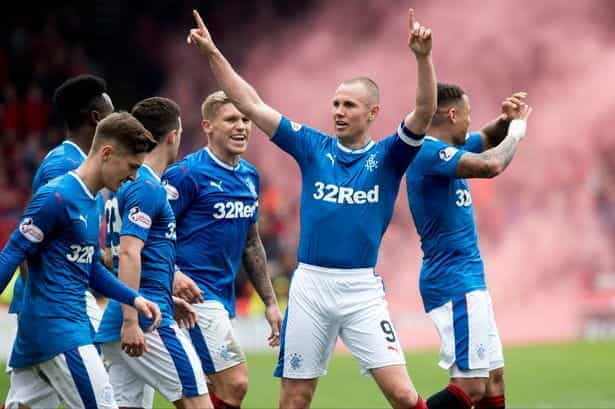 The Rangers kit with 32Red sponsorship visible on the front.