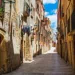 A sunny alley in Catalu?a, Tarragona, Spain.