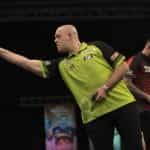 Michael van Gerwen throwing a dart during the 2021 Grand Slam of Darts.